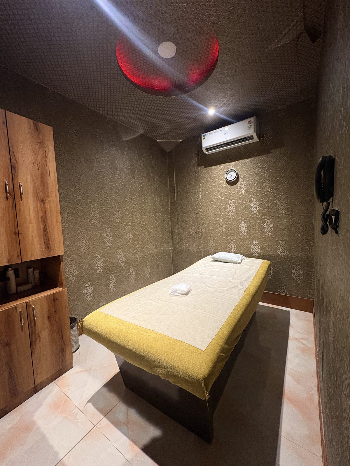 Quiet treatment room with a massage table